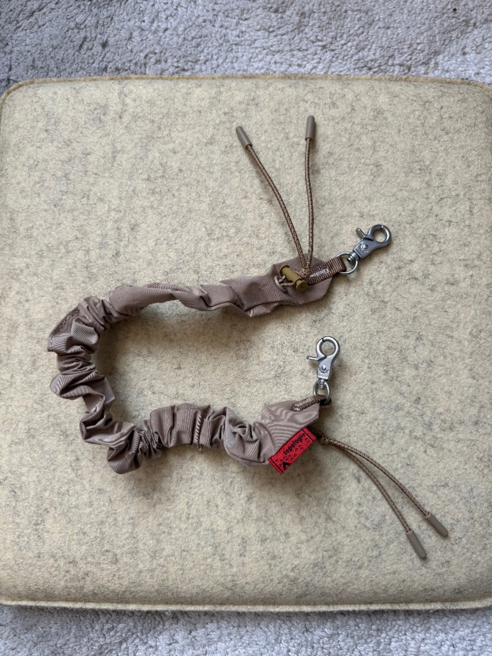 [NWOT] Topologie Bungee Wrist Strap in Beige Tech Sateen